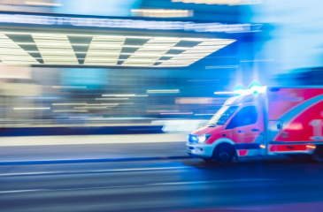 Ambulance rushing with blurred lights