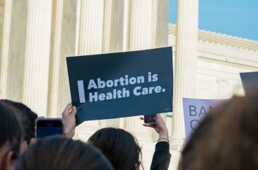 Rally for a abortion rights with a sign reading "Abortion is Health Care"